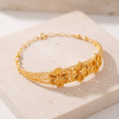 Diamond Cut Flower Cuff Bracelet (D4) on travertine