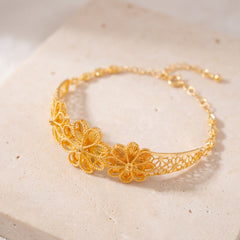 Diamond Cut Flower Cuff Bracelet (D5) on travertine
