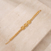 Diamond Cut Frame Bracelet (D1) on travertine