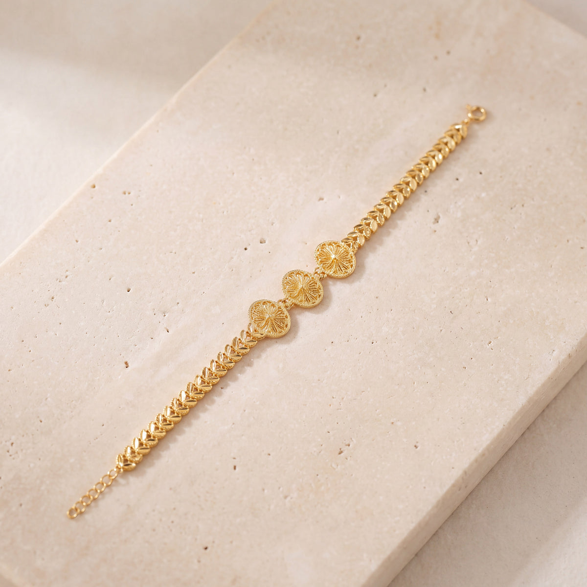 Diamond Cut Oval Bracelet (D1) on travertine