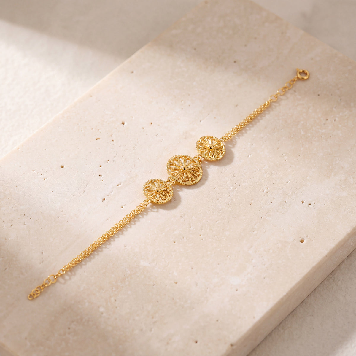 Diamond Cut Oval Bracelet (D2) on travertine