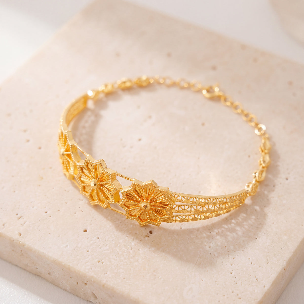 Diamond Cut Star Cuff Bracelet (D1) on travertine