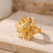 Double Flower Ring (RP) on travertine