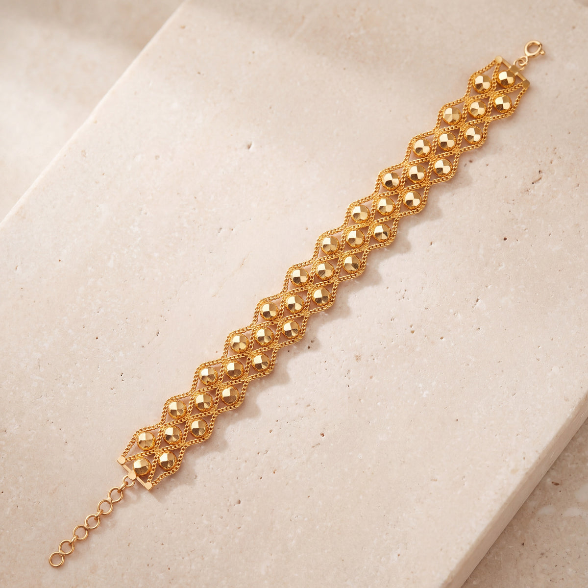 Dye cast & Chain Bracelet (D11) on travertine