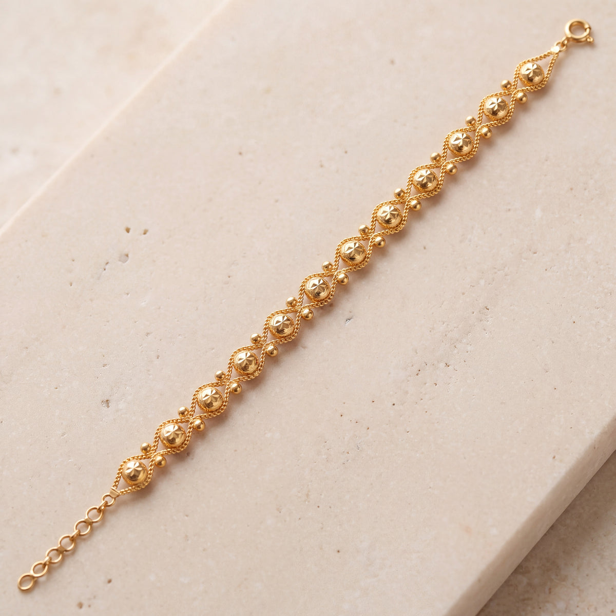 Dye cast & Chain Bracelet (D17) on travertine