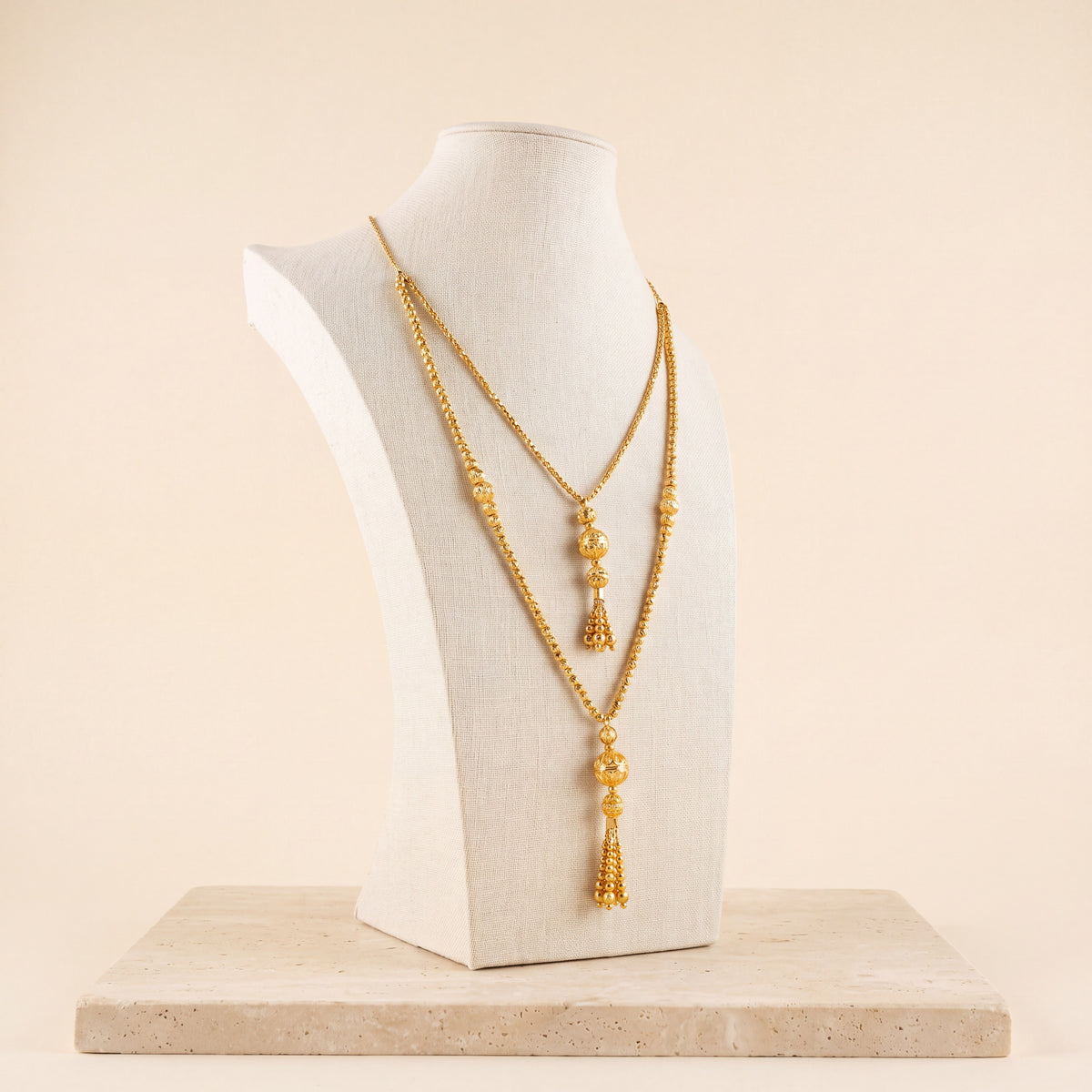 2 Line RP Beads Mala Necklace 5 on travertine