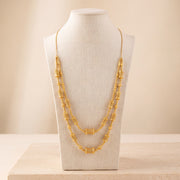 2 Line RP Mala Necklace 1 on travertine
