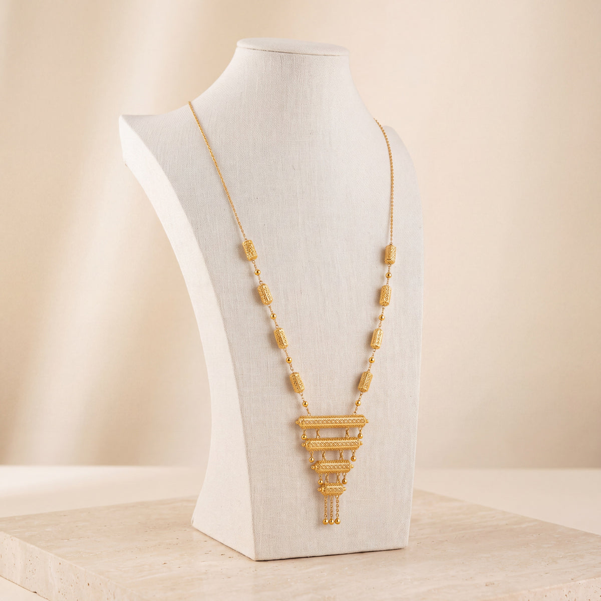 4 Step Mala Necklace 1 on travertine
