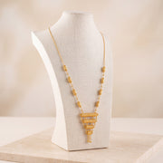 4 Step Mala Necklace 5 on travertine