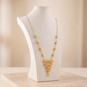 4 Step Mala Necklace 6 on travertine