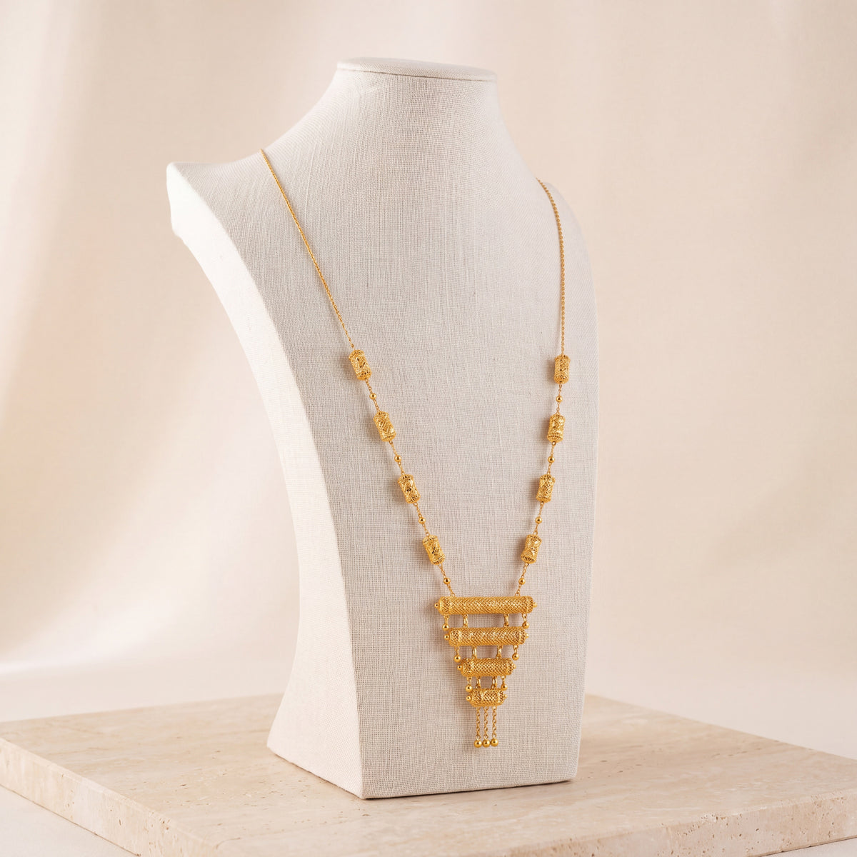 4 Step Mala Necklace 7 on travertine