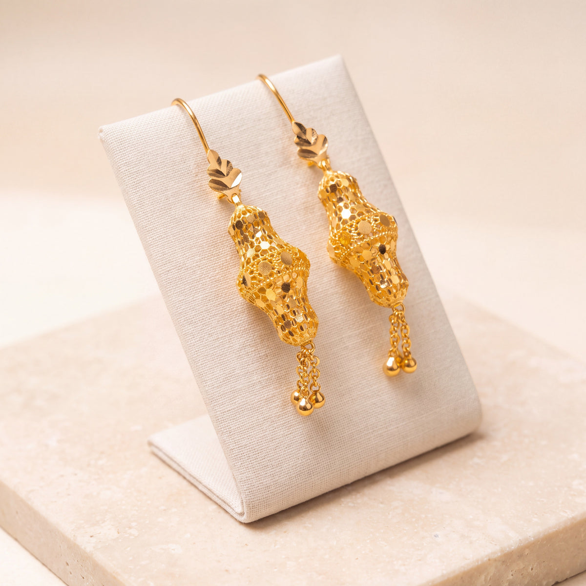 Barrel Earrings 22 on travertine