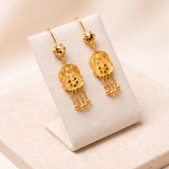 Casting Earrings (D1) on travertine