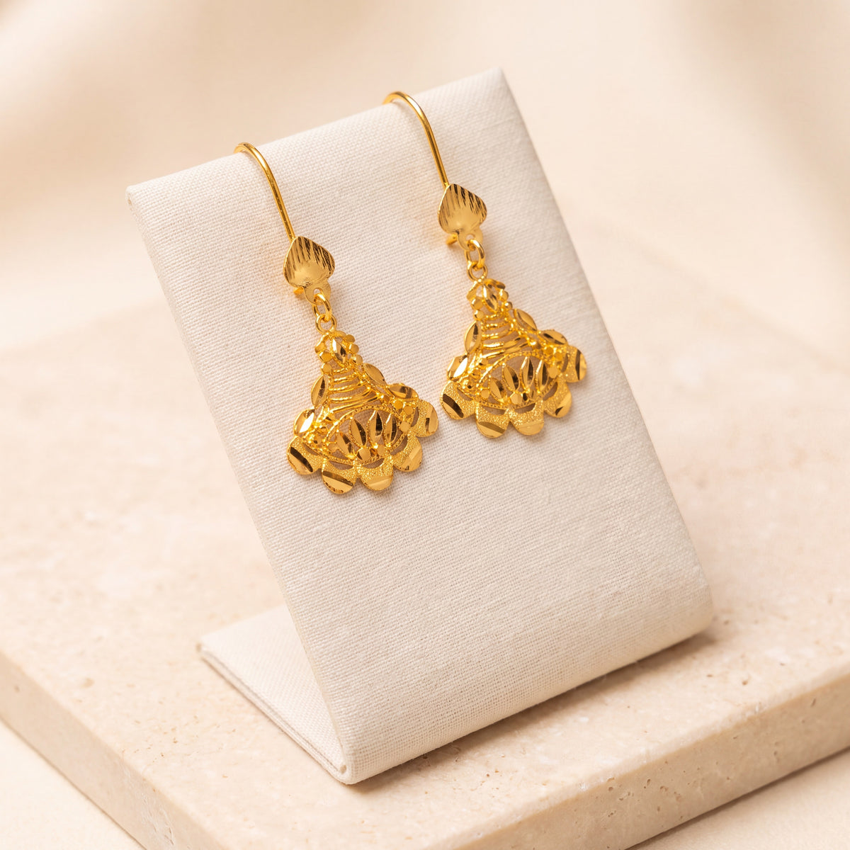 Casting Earrings (D11) on travertine