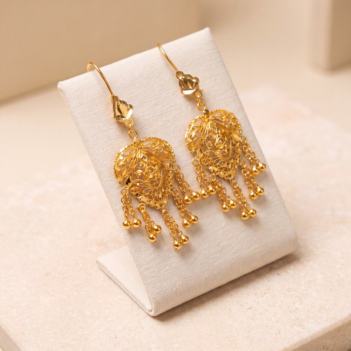 Casting Earrings (D16) on travertine