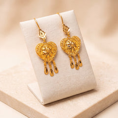 Casting Earrings (D18) on travertine