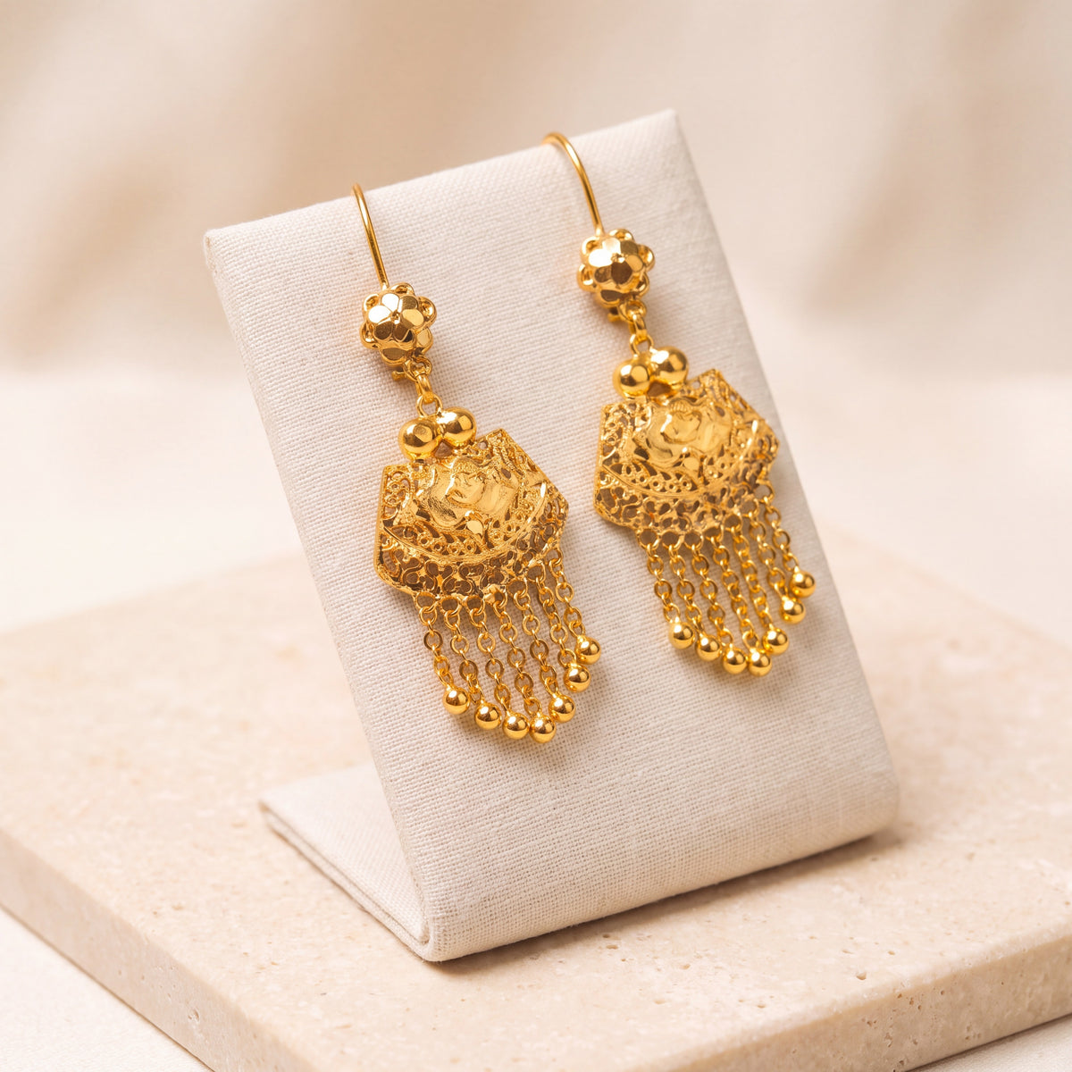 Casting Earrings (D23) on travertine