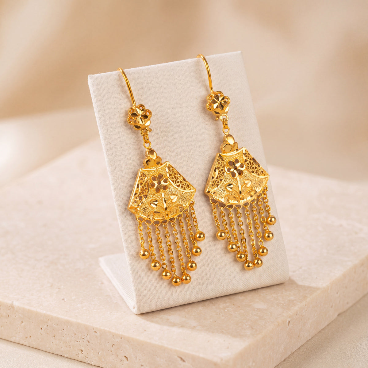 Casting Earrings (D25) on travertine