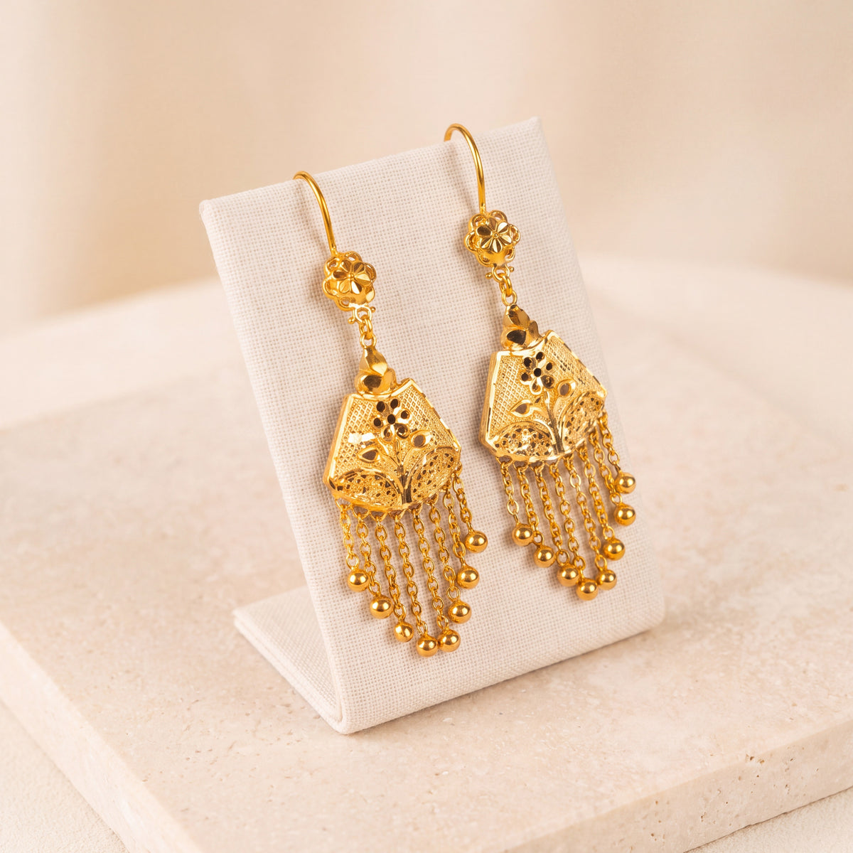 Casting Earrings (D26) on travertine