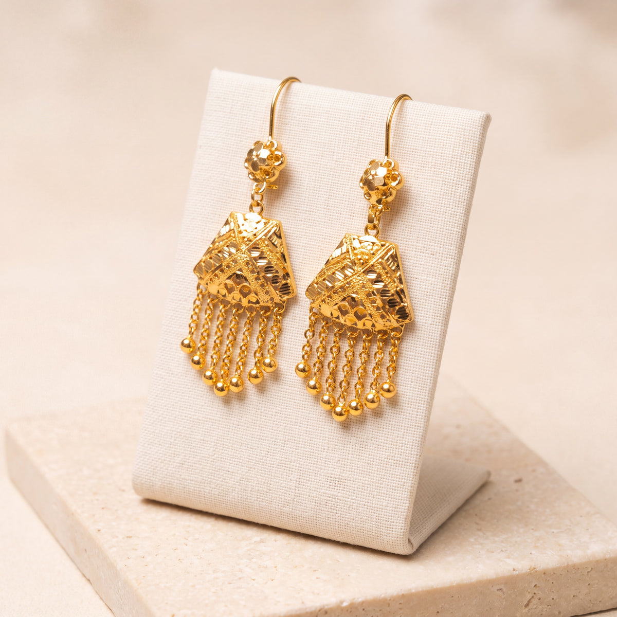 Casting Earrings (D3) on travertine
