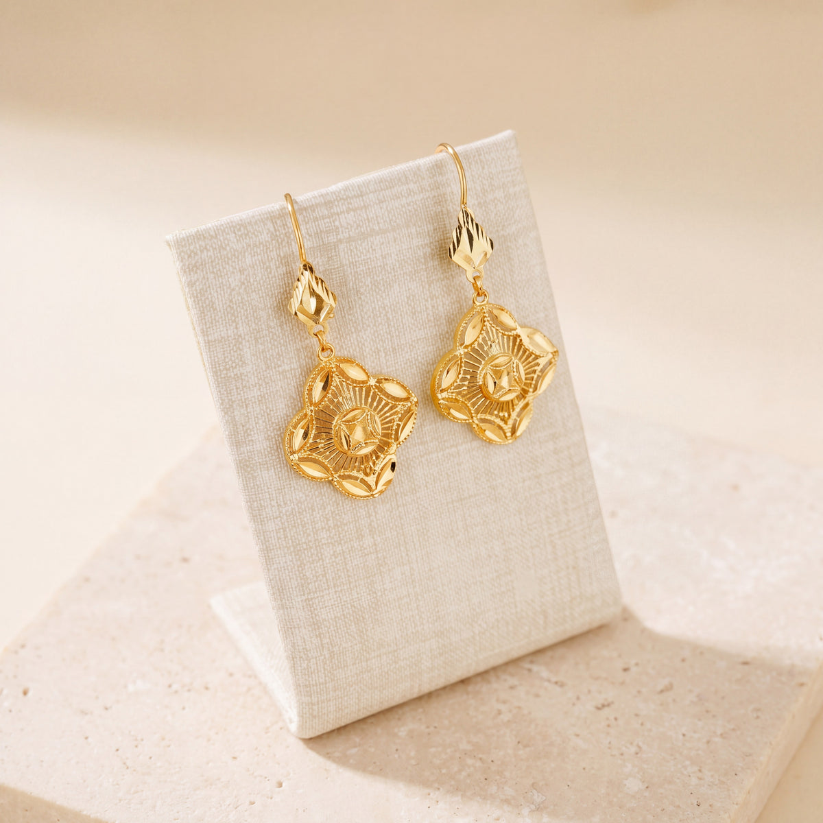 Casting Earrings (D32) on travertine