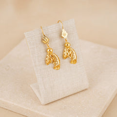 Casting Earrings (D33) on travertine