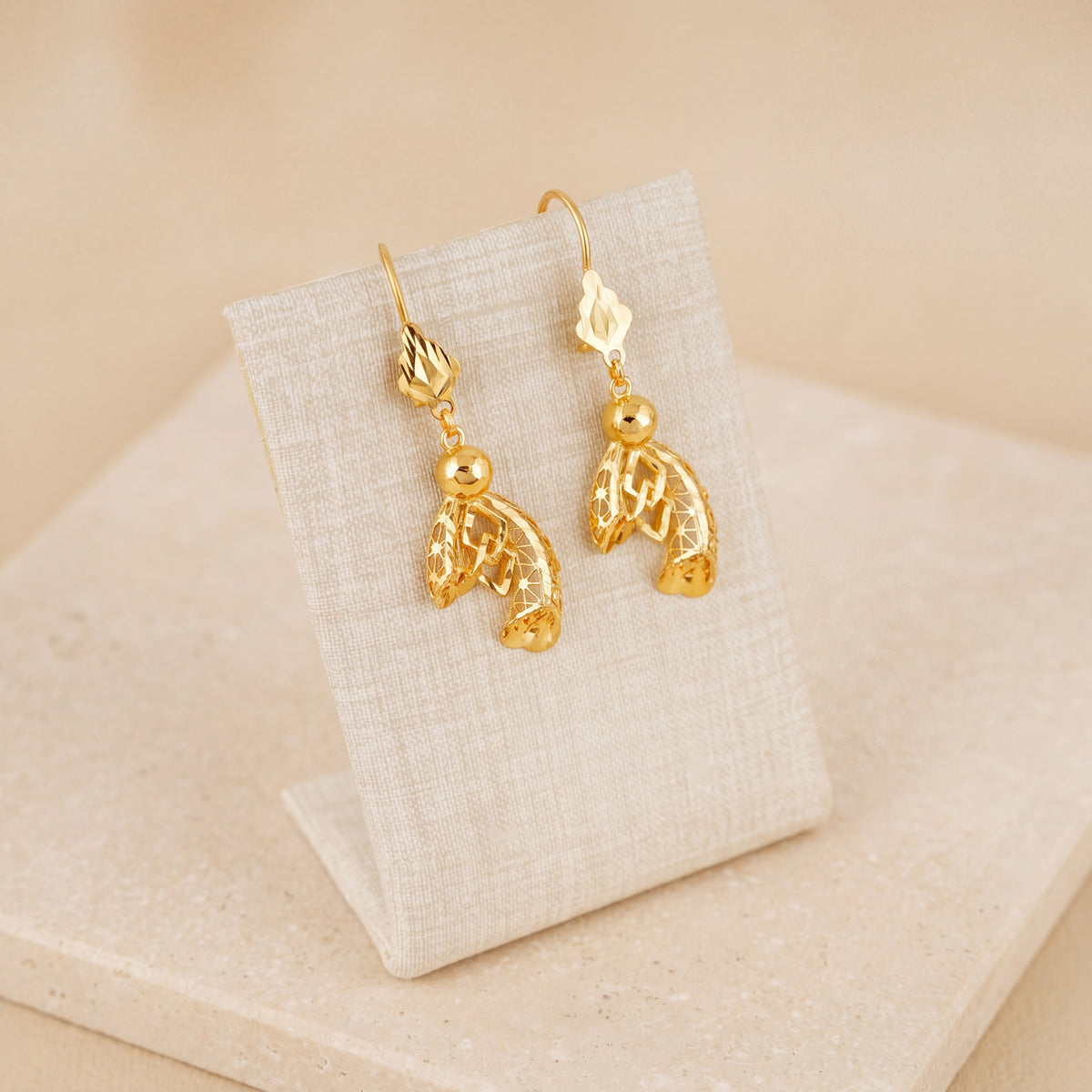 Casting Earrings (D33) on travertine