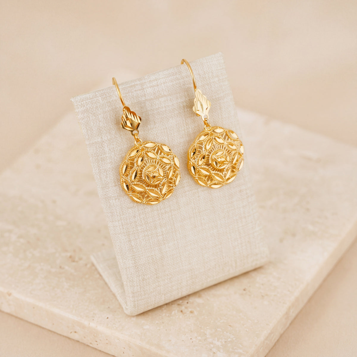 Casting Earrings (D36) on travertine