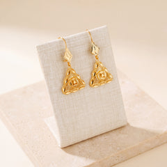 Casting Earrings (D37) on travertine