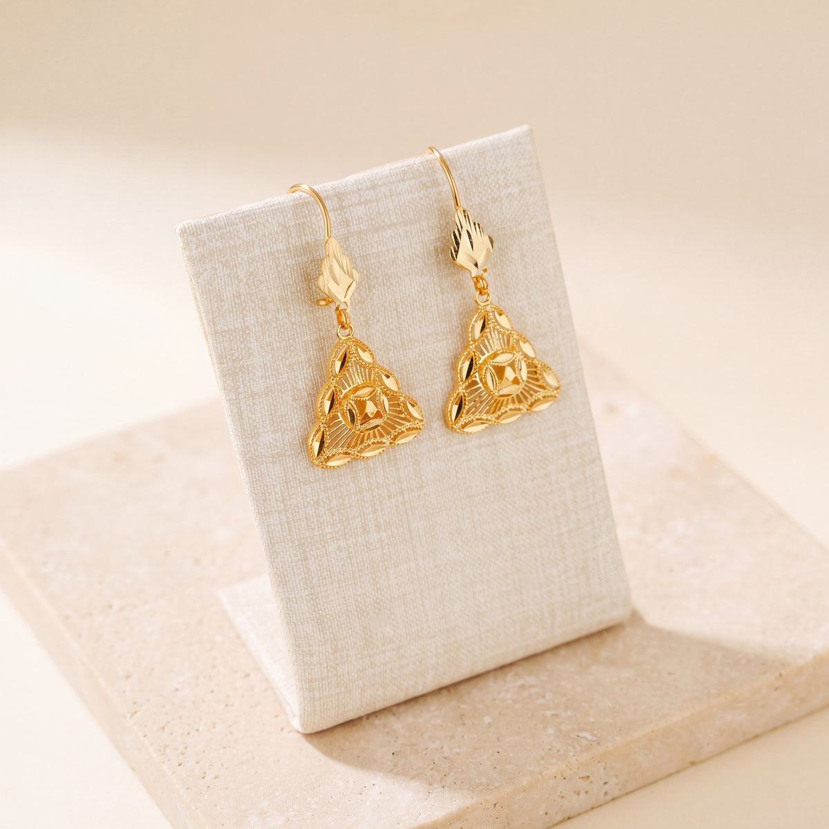 Casting Earrings (D37) on travertine