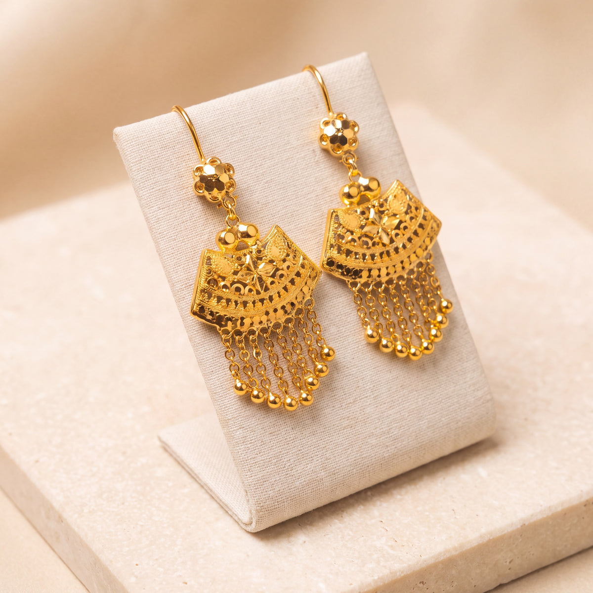 Casting Earrings (D4) on travertine
