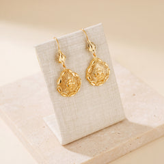 Casting Earrings (D40) on travertine