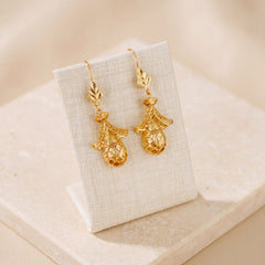 Casting Earrings (D41) on travertine