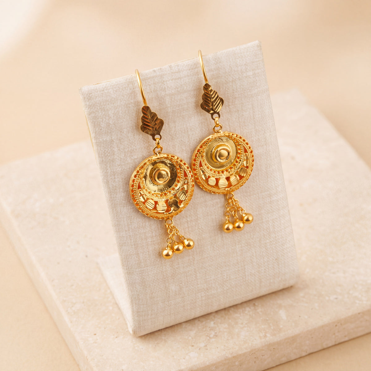 Casting Earrings (D43) on travertine