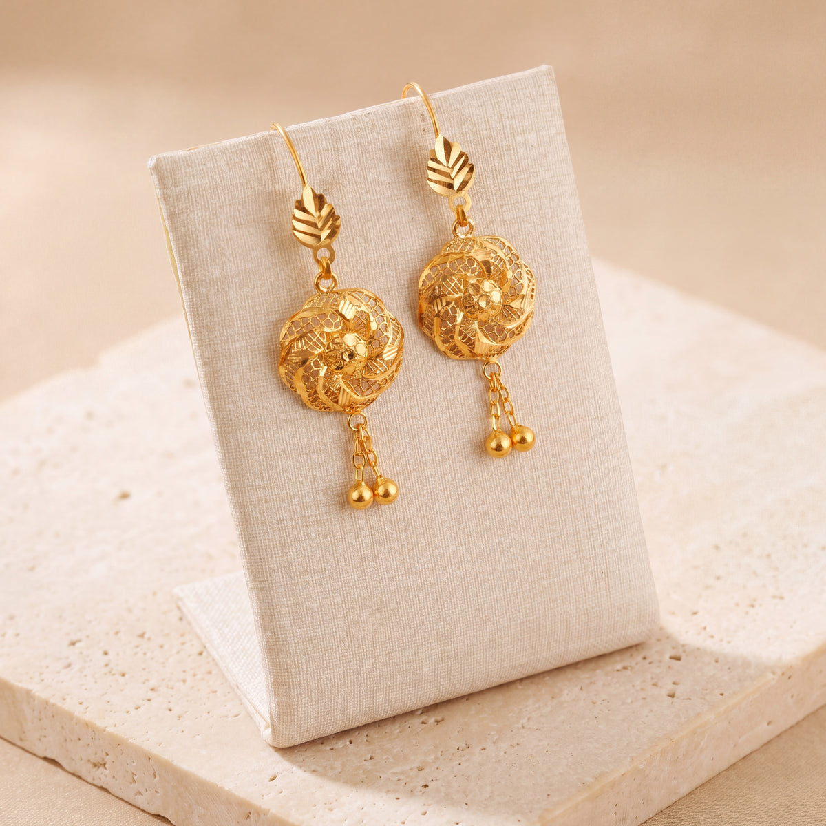 Casting Earrings (D46) on travertine