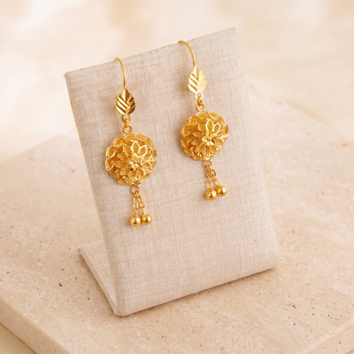 Casting Earrings (D47) on travertine
