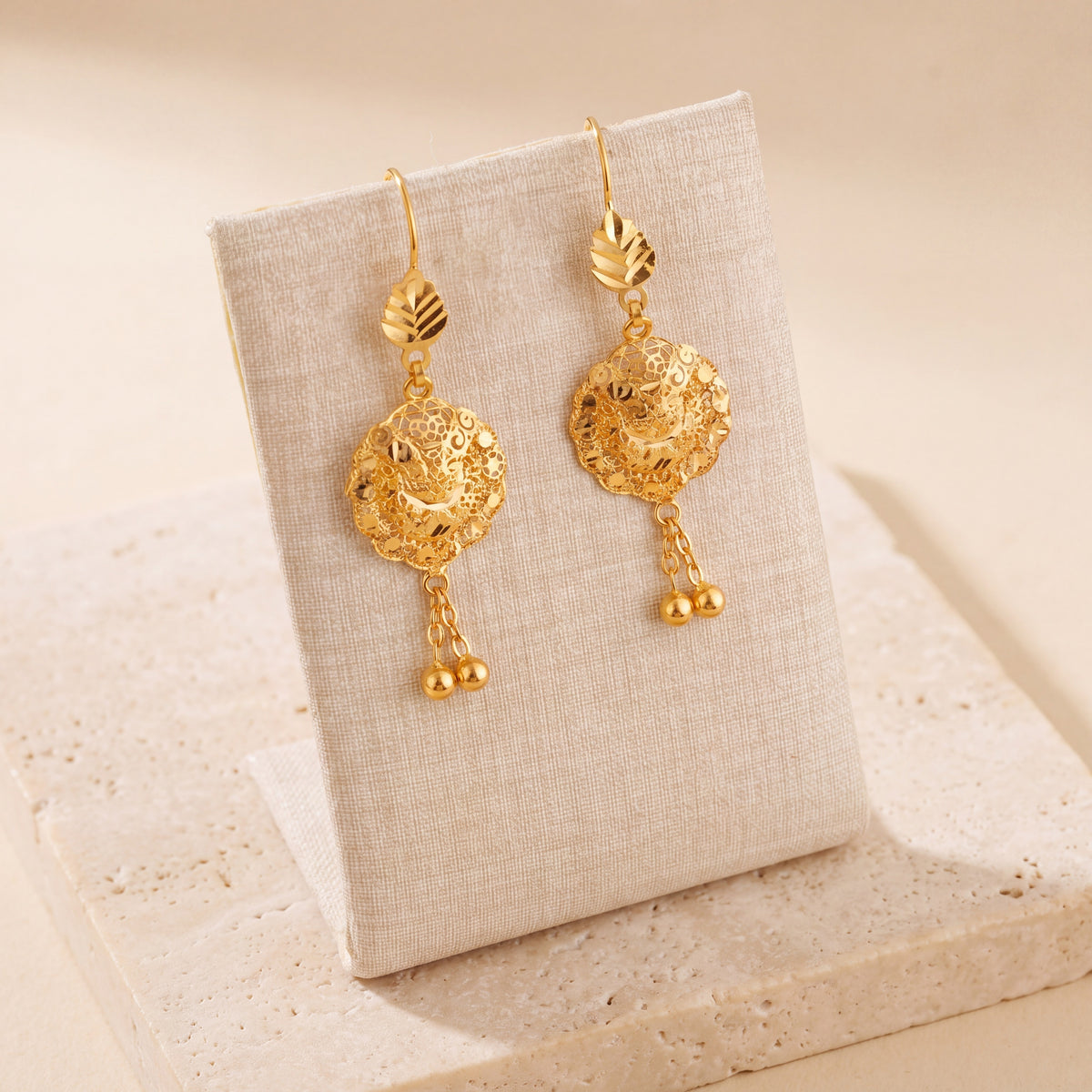 Casting Earrings (D48) on travertine