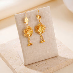 Casting Earrings (D50) on travertine