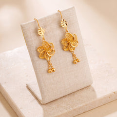 Casting Earrings (D52) on travertine