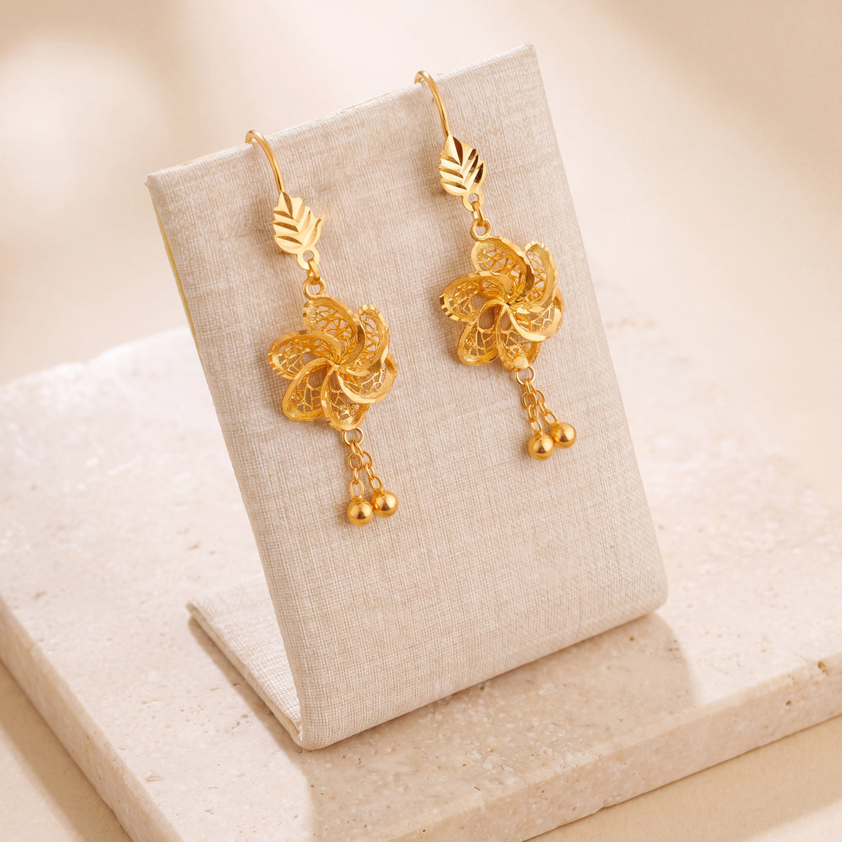 Casting Earrings (D52) on travertine