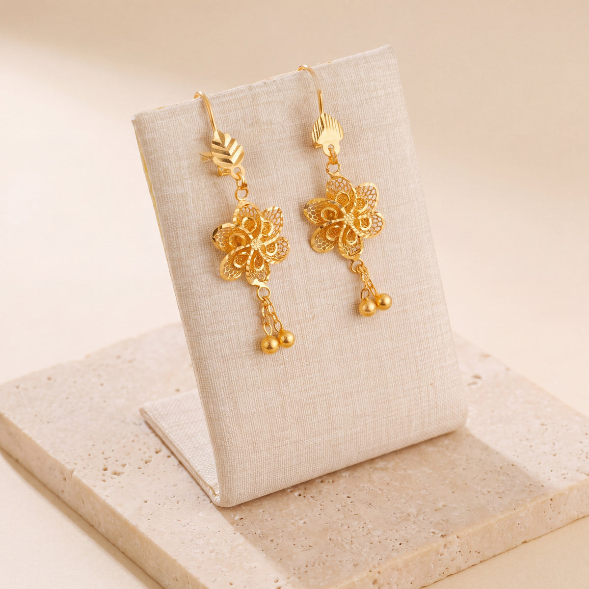 Casting Earrings (D53) on travertine