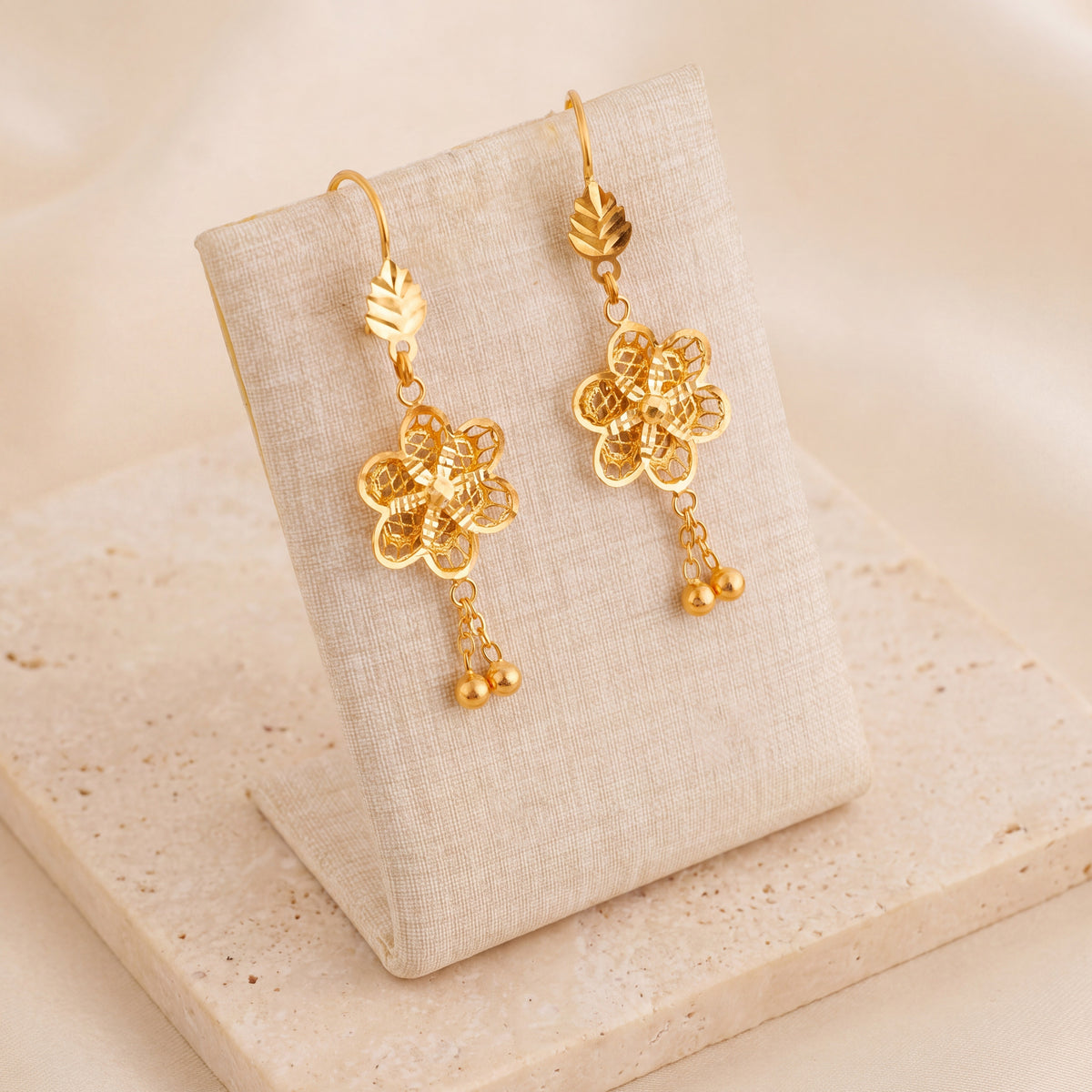 Casting Earrings (D56) on travertine