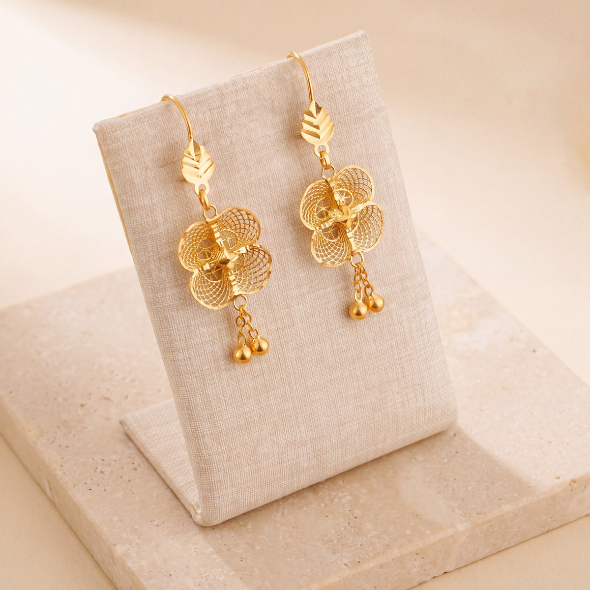 Casting Earrings (D57) on travertine