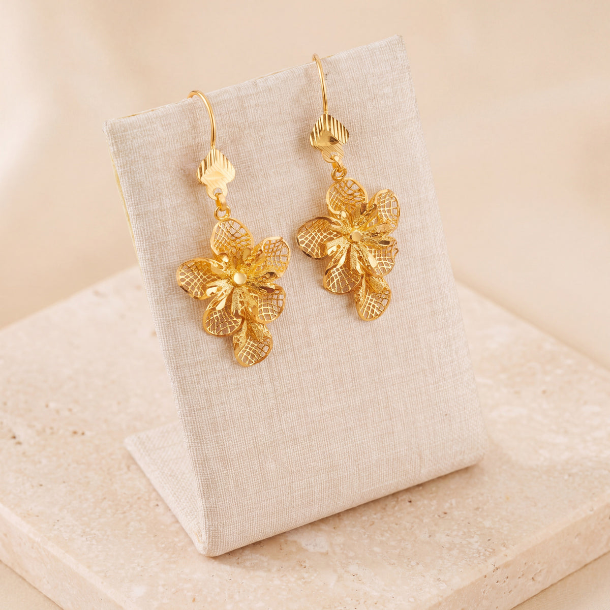 Casting Earrings (D58) on travertine