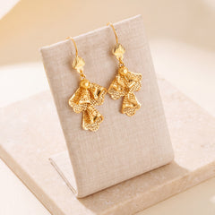 Casting Earrings (D59) on travertine