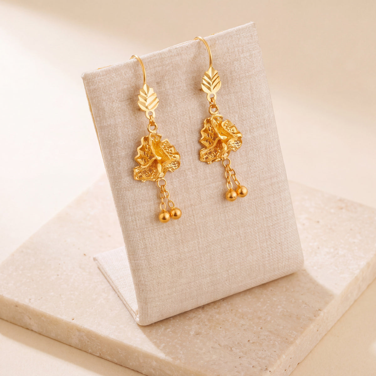 Casting Earrings (D60) on travertine