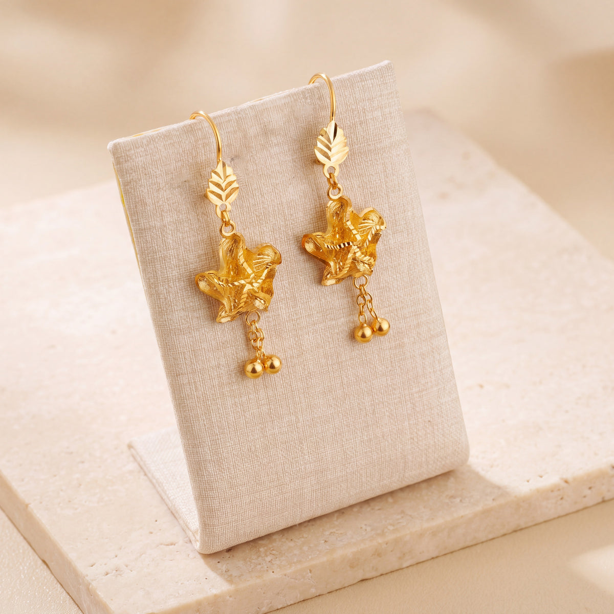 Casting Earrings (D61) on travertine