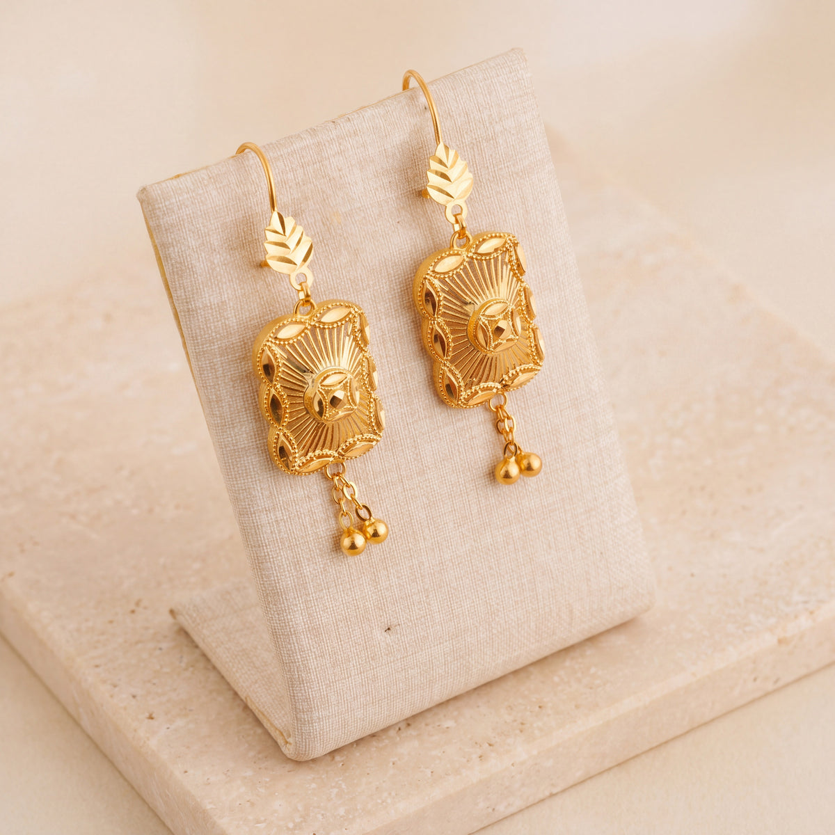 Casting Earrings (D62) on travertine