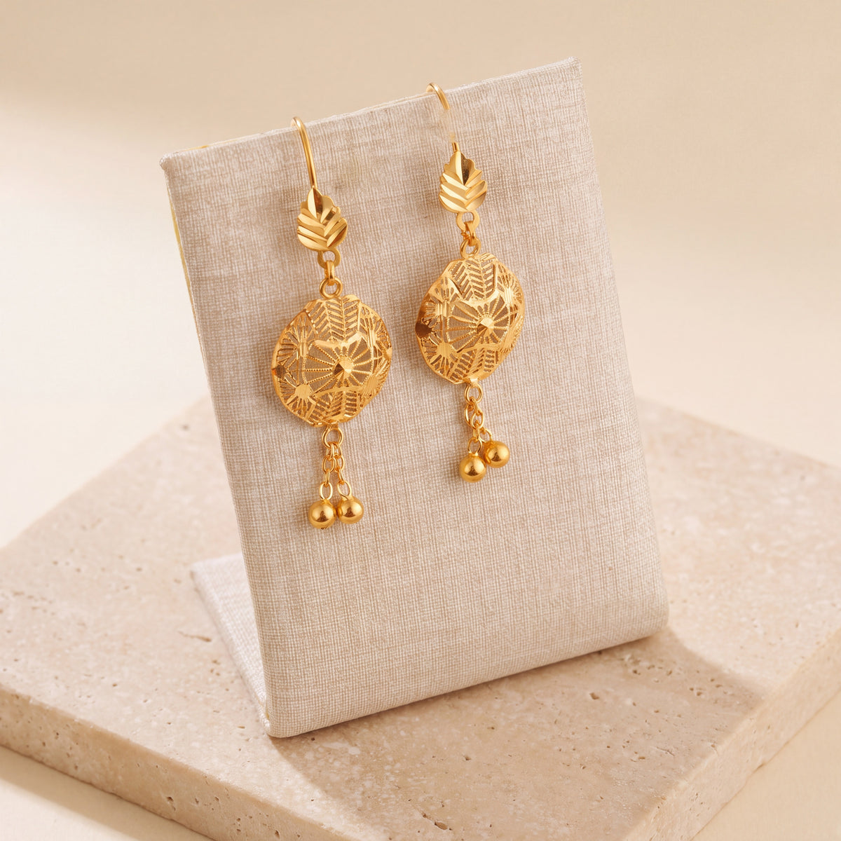 Casting Earrings (D63) on travertine