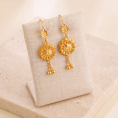 Casting Earrings (D64) on travertine